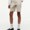 Baggy stretch-chinoshorts med bälte för barn Baggy stretch-chinoshorts med bälte för barn