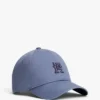 Broderad monogram-kepsar Broderad monogram-kepsar