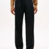 Byxor med plissering och avslappnad passform