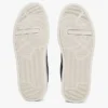 Court-sneakers med ton-i-ton-logotyp