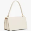 Crossbody-väska med monogram och lock Crossbody-väska med monogram och lock