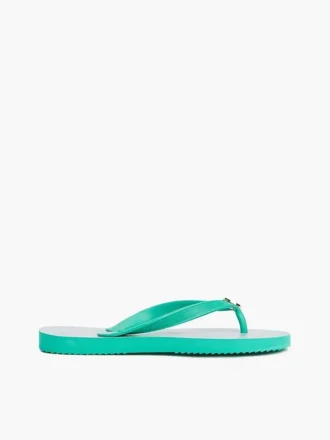Flip-flops med metallbeslag och monogramtryck