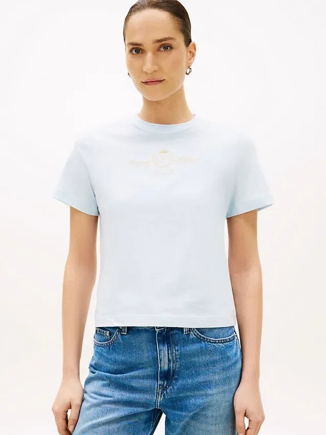 Guldtonad T-shirt med klubbens emblem Guldtonad T-shirt med klubbens emblem