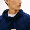Hoodie i velourjacquard med flagglogo över hela plagget Hoodie i velourjacquard med flagglogo över hela plagget