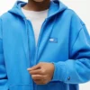 Hoodie med dragkedja och ton-i-ton-flagga för barn Hoodie med dragkedja och ton-i-ton-flagga för barn