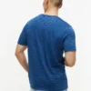 Indigofärgad randig T-shirt med ficka Indigofärgad randig T-shirt med ficka