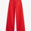 Jeans med hög midja, vid ben och rå kant