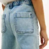 Jeans med påsydda fickor och vid ben för barn