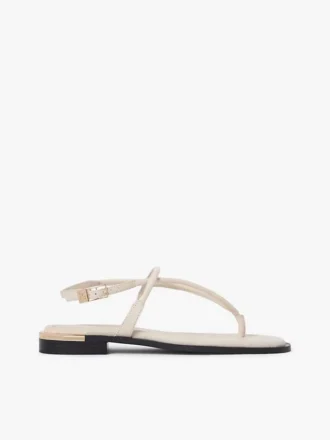 Lädersandal med metalliska detaljer