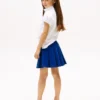 Plisserad kjol i enfärgat tyg för barn