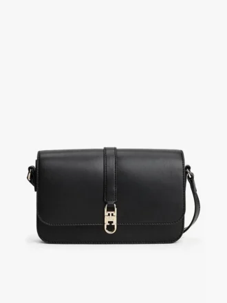 Polerad crossbody-väska med monogram och lock