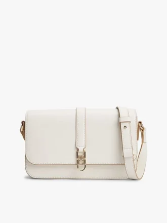 Polerad crossbody-väska med monogram och lock