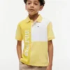 Polo i stretch med färgblock och logotyp för barn