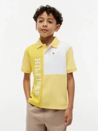 Polo i stretch med färgblock och logotyp för barn