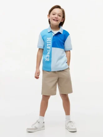 Polo i stretch med färgblock och logotyp för barn