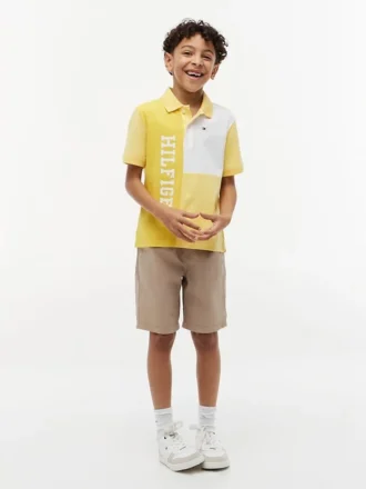 Polo i stretch med färgblock och logotyp för barn