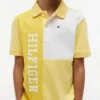 Polo i stretch med färgblock och logotyp för barn