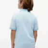 Polo i stretch med färgblock och logotyp för barn