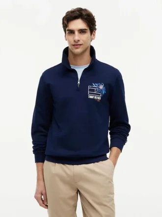 Polo-tröja med blommig logotyp och kvartslång dragkedja