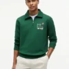 Polo-tröja med blommig logotyp och kvartslång dragkedja Polo-tröja med blommig logotyp och kvartslång dragkedja