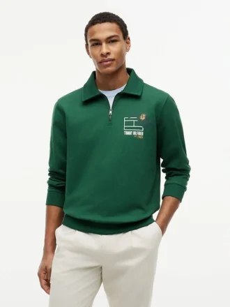 Polo-tröja med blommig logotyp och kvartslång dragkedja