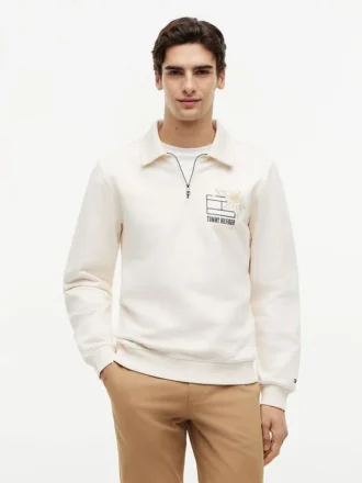Polo-tröja med blommig logotyp och kvartslång dragkedja