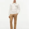 Polo-tröja med blommig logotyp och kvartslång dragkedja Polo-tröja med blommig logotyp och kvartslång dragkedja