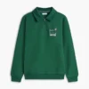 Polo-tröja med blommig logotyp och kvartslång dragkedja Polo-tröja med blommig logotyp och kvartslång dragkedja