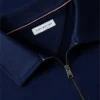 Polo-tröja med blommig logotyp och kvartslång dragkedja Polo-tröja med blommig logotyp och kvartslång dragkedja