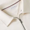 Polo-tröja med blommig logotyp och kvartslång dragkedja Polo-tröja med blommig logotyp och kvartslång dragkedja