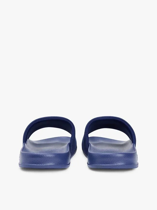 Pooltofflor i canvas med monogram Pooltofflor i canvas med monogram