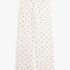 Pyjamasbyxor i jersey med blommönster Pyjamasbyxor i jersey med blommönster
