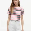 Randig T-shirt med guldknappar Randig T-shirt med guldknappar