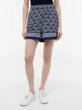 Shorts i voile med monogramtryck över hela plagget