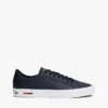 Sneakers i vulkaniserat läder med flaggstripe