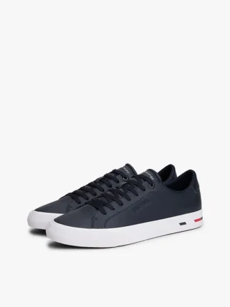 Sneakers i vulkaniserat läder med flaggstripe