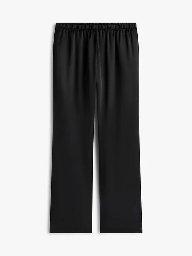 Stretchiga satinbyxor med vid ben och dragkedja Stretchiga satinbyxor med vid ben och dragkedja