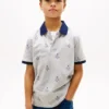 Stretchpolo med nautiskt logo-mönster för barn Stretchpolo med nautiskt logo-mönster för barn
