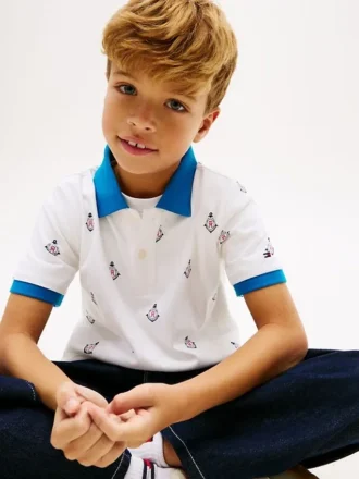 Stretchpolo med nautiskt logo-mönster för barn