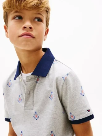 Stretchpolo med nautiskt logo-mönster för barn