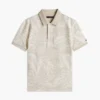 Stretchpolo med tropiskt tryck för barn Stretchpolo med tropiskt tryck för barn