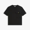 T-shirt med avslappnad passform och ficka med guldknapp