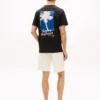 T-shirt med palmträd på ryggen