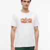 T-shirt med tropiskt blommönster T-shirt med tropiskt blommönster