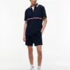 Tommy Jeans avslappnad polotröja med kvartslång dragkedja Tommy Jeans avslappnad polotröja med kvartslång dragkedja