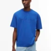 Tommy Jeans T-shirt med slitet logo Tommy Jeans T-shirt med slitet logo