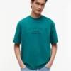 Tommy Jeans T-shirt med slitet logo Tommy Jeans T-shirt med slitet logo