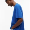Tommy Jeans T-shirt med slitet logo Tommy Jeans T-shirt med slitet logo