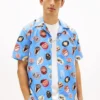 Tommy Jeans tryckt poplin-campskjorta Tommy Jeans tryckt poplin-campskjorta