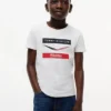 Tommy x Cadillac F1® Team Chevron T-shirt för barn Tommy x Cadillac F1® Team Chevron T-shirt för barn